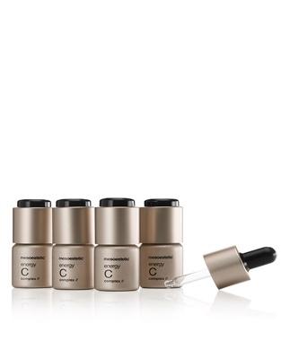 A picture containing table, bottle, computer, lotion Description automatically generated